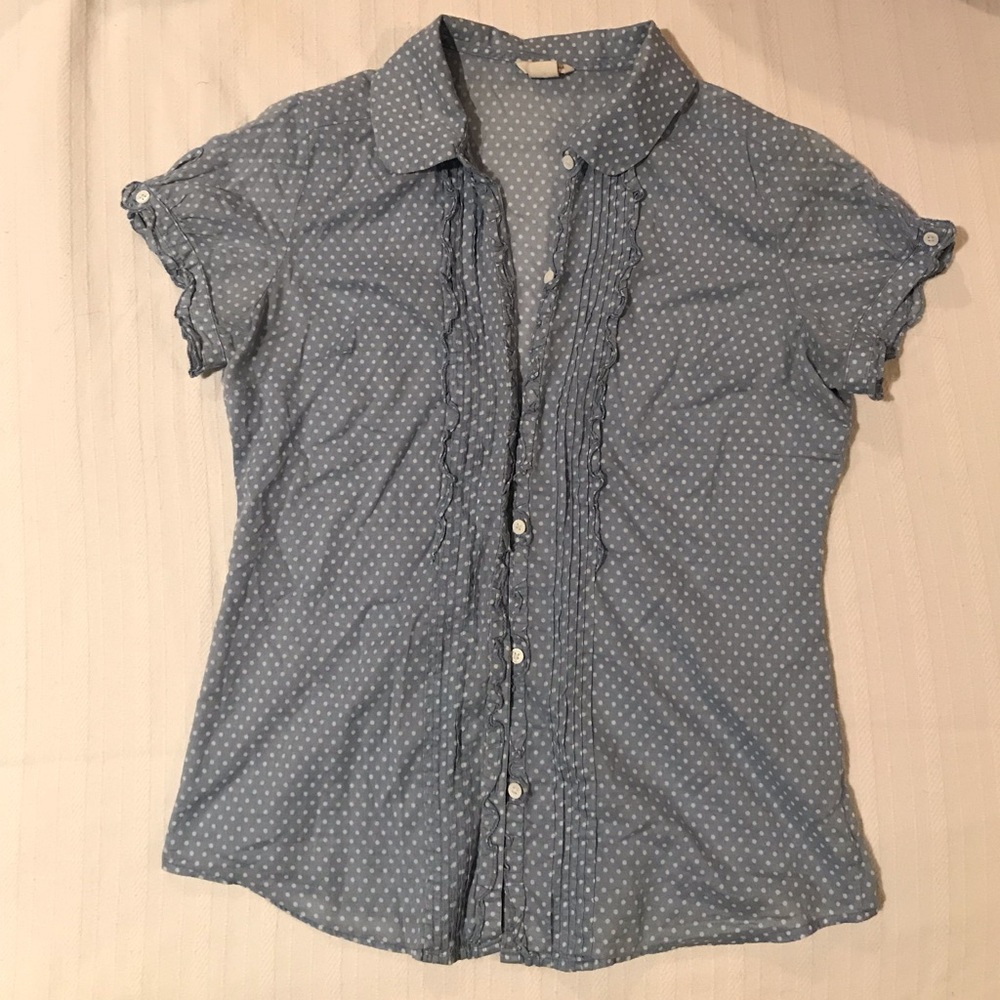 Light blue button up blouse with white polka dots